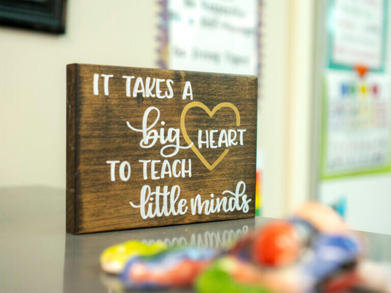 An inspirational sign displayed in a classroom